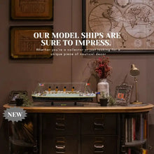 Model ship on a desk with decorative items and text about model ships.